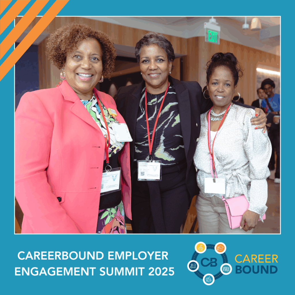 Three attendees of the employer summit post for a photo